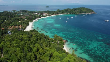 Aerial-of-beautiful-beach-and-boats-in-Koh-Lipe,-Thailand