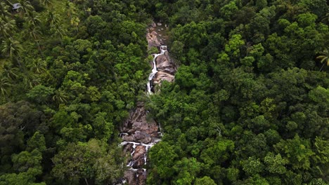 An-aerial-shot-of-Than-Sadet-waterfall-Koh-Phangan,-Thailand-1