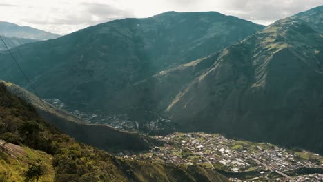 The-Swing-At-The-End-Of-The-World-In-Banos,-Ecuador-With-Panoramic-City