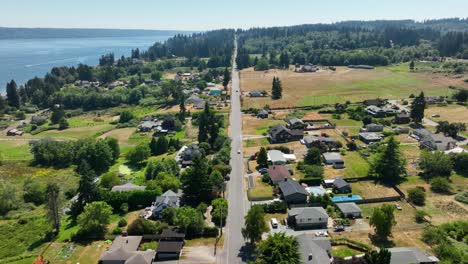 Aerial-of-a-back-country-road-cutting-through-the-Clinton-community-on-Whidbey-Island