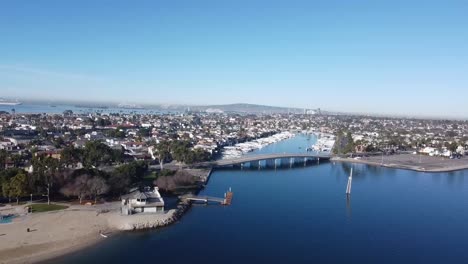 Drone-flies-over-bridge-on-water-channel