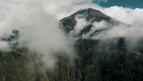 Aerial-View-Of-Misty-Landscape-Of-Tungurahua-Volcano-In-Baños-de-Agua-Santa-In-Ecuador---drone-shot