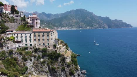 Flying-over-Amalfi,-streets,-buildings-and-mediterranean-sea-filmed-by-drone-in-4k