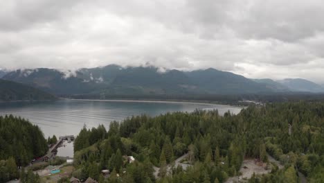 Drone-shot-to-reveal-the-town-of-Port-Renfrew,-British-Columbia