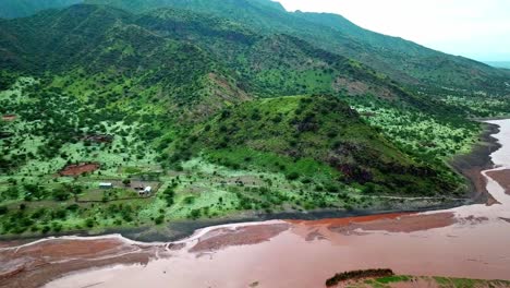 Idyllic-Coastline-Of-Lake-Natron-In-The-Great-Rift-Valley-In-Tanzania---aerial-drone-shot
