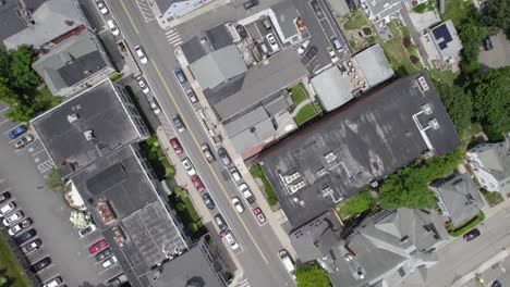 Aerial-view-above-traffic-on-the-streets-of-Plymouth,-USA---top-down,-drone-shot