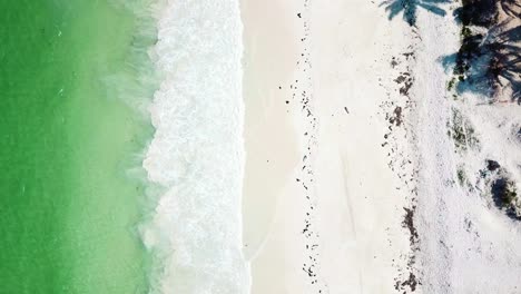 Vertical-Shot-Of-Turquoise-Beach-Of-Diani-Near-Mombasa-Coastal-Town-In-Kenya-Coast,-East-Africa