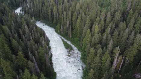 Aerial-Drone-Incredible-White-Water-Soo-River-with-Pine-Trees-and-Pacific-Mountain-Range-Canada-4K