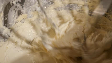 Close-up-showing-the-detail-of-sweetened-condensed-milk-being-shipped-with-butter