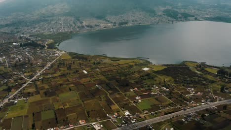 Laguna-de-San-Pablo-And-Its-Surroundings-In-Otavalo,-Ecuador---aerial-panoramic