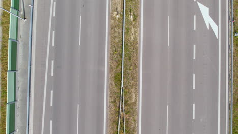 Empty-highway-during-covid-lockdown,-low-aerial-view-on-lanes