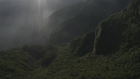Cinematic-drone-shot-over-Madeira-island-with-fog-in-the-sunrise