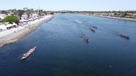 Aerial-view-of-dragon-boats-race-down-water-channel