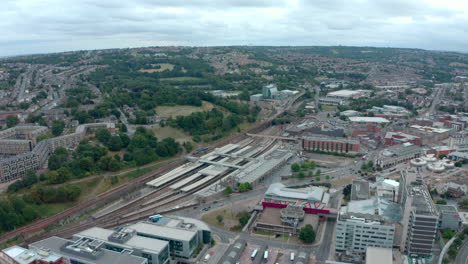 Establishing-pan-down-drone-shot-of-Sheffield-City-train-station
