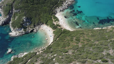 Aerial-top-down-shot-of-a-picturesque-double-beach-in-the-middle-of-the-shot