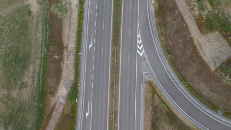 Highway-with-bridge-over-it,-aerial-top-down-view