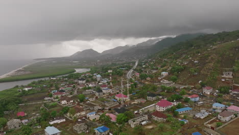Aerial-flyover-of-the-coast-of-Sierra-Leone-along-the-Atlantic-Ocean-after-a-rain-storm
