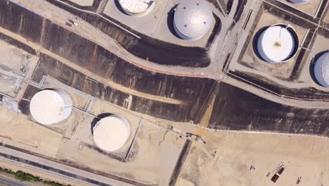 Top-view-of-large-storage-silos-in-oil-refinery