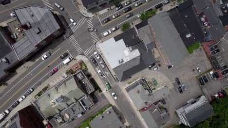 Aerial-view-over-the-townscape-of-Plymouth,-USA---rotating,-overhead,-drone-shot