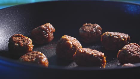 Close-Up-Of-Ground-Turkey-Meatballs-In-Non-stick-Frying-Pan