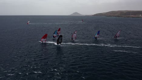 Fast-windsurf-race-action-captured-from-air,-drone-footage-in-4K,-48fps