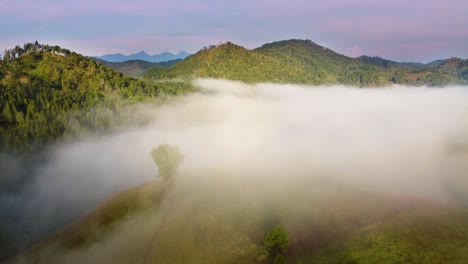 Drone-shot-of-a-foggy-mountain