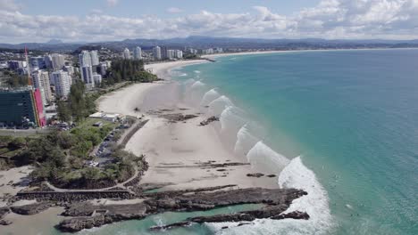 Aerial-View-Of-Rock-View-Ocean-Park-Near-Snapper-Rocks-And-Rainbow-Bay-Surf-Club-Bar-In-Coolangatta,-Queensland,-Australia