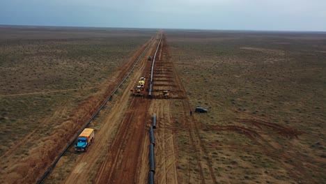 Aerial-view-of-the-construction-of-natural-gas-and-oil-pipeline-in-the-desert