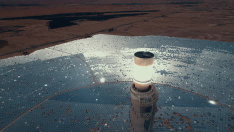 Solar-power-tower-focused-sunlight-for-movable-mirrors-at-the-desert-in-a-cloudless-day--close-up-tilt-down-drone-dolly-in-shot
