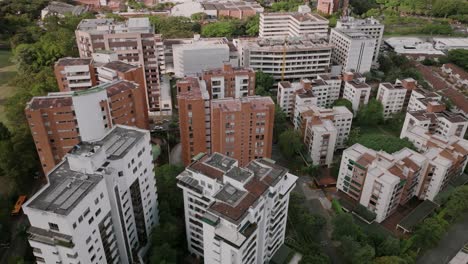 Slow-aerial-flyover-of-apartment-buildings-in-the-suburbs-of-Cali,-Colombia