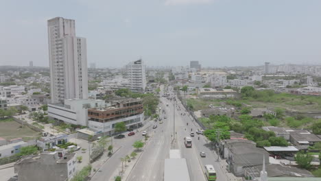 Wide-aerial-flyover-of-busy-streets-in-Cartagena,-Colombia