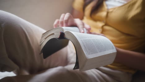 Unrecognizable-Woman-Reading-Bible-At-Home.-Closeup
