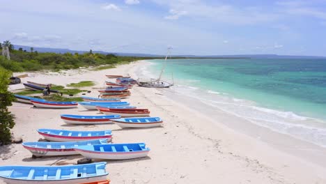 Traditional-fishing-boats-beached-at-perfect-Playa-Pedernales
