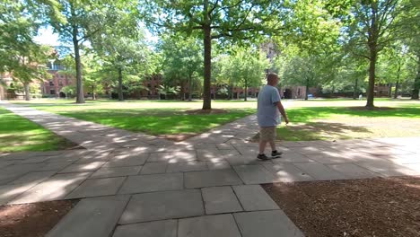 4K-Man-walking-on-Campus-left-to-right