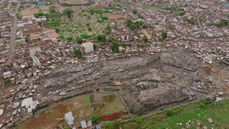 Slow-aerial-flyover-of-a-landfill-in-Freetown-in-Sierra-Leone