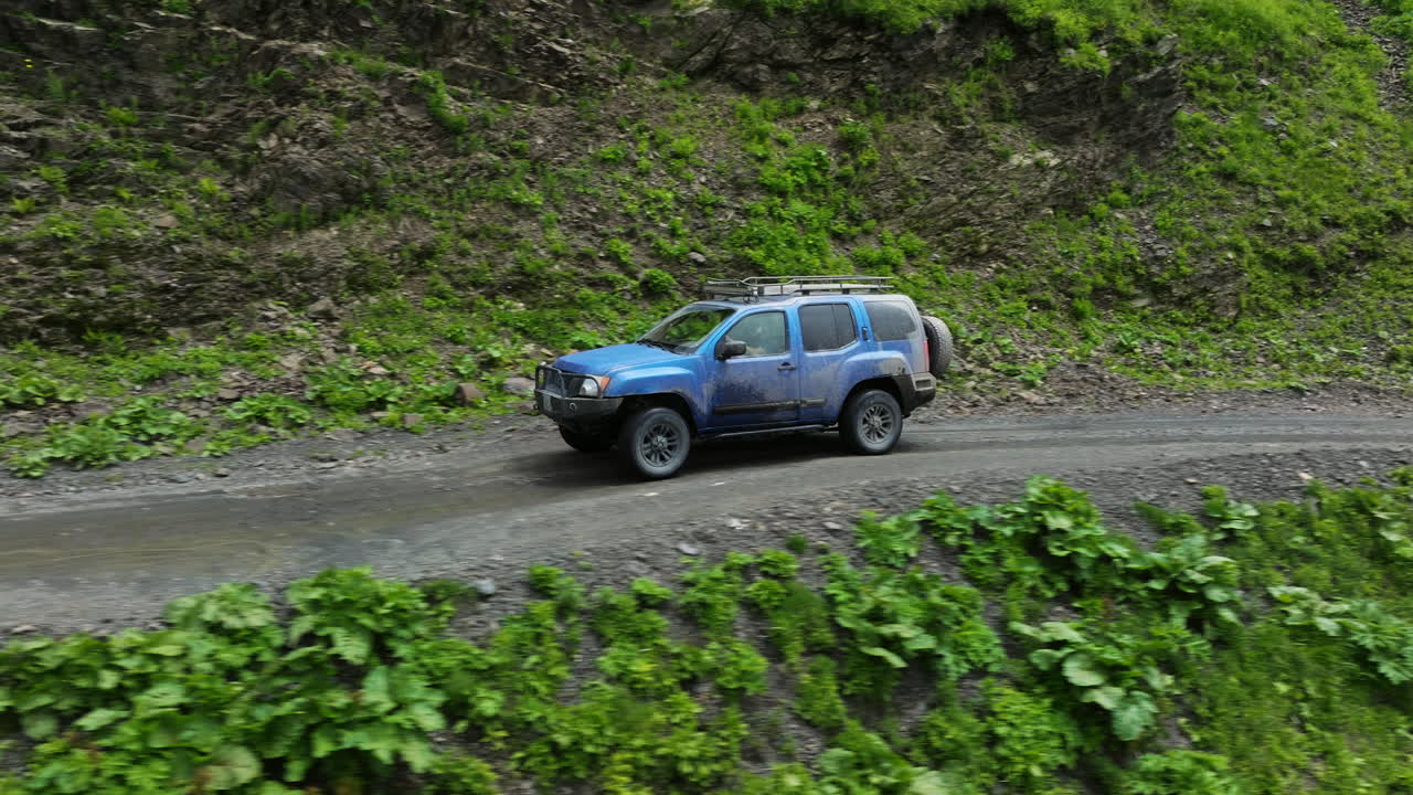 Car Jangal Xxx Video - Premium stock video - Suv car driving on muddy abano pass, most dangerous  mountain road in tusheti, georgia