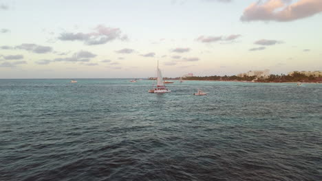 Catamaran-at-Sunset-on-Tropical-Caribbean-Island