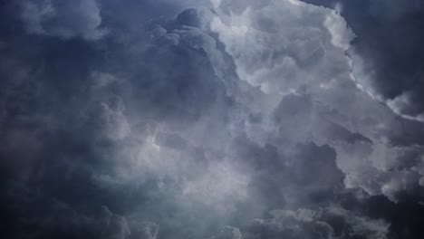Dark-cumulonimbus-clouds-in-the-dark-sky,-thunderstorm-4K