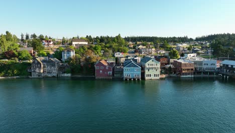 Aerial-shot-pushing-towards-Coupeville-shops-hanging-out-over-the-historic-waterfront