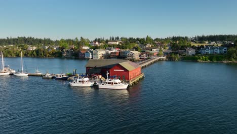 Drone-shot-of-the-Coupeville-wharf-extending-from-the-city's-historic-downtown