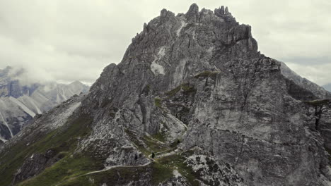 Beautiful-backwards-aerial-of-alpine-mountains-Stubai,-Austria