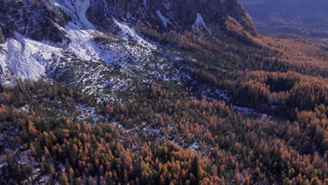 Above-mountainous-forest-valley-in-north-Italian-Dolomites,-autumn-season