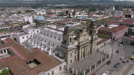 Slow-aerial-flyover-of-the-Metropolitan-Cathedral-of-Santiago-of-Guatemala's-steeples