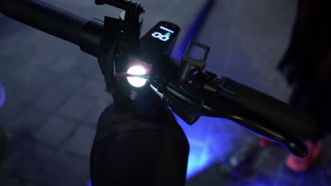 Cool-flashlight-mounted-on-an-electric-scooter