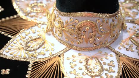 Close-up-of-a-traditional-Mexican-sombrero-with-golden-color-designs