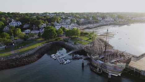 Aerial-view-of-the-Mayflower-II-17th-century-ship-docked-at-the-town-of-Plymouth,-Massachusetts,-USA