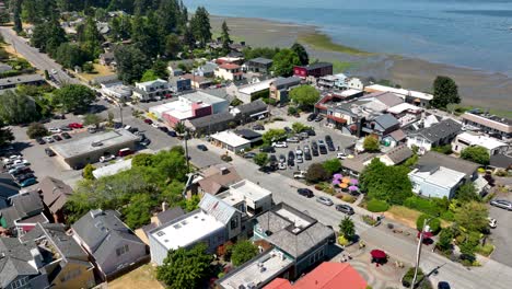 Orbiting-aerial-view-of-the-main-street-stores-in-Langley,-Washington