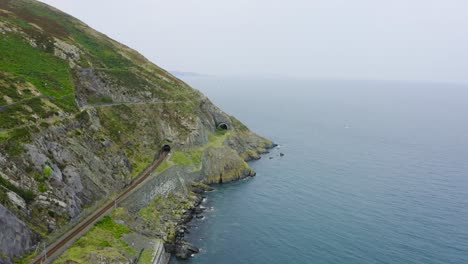 Aerial-view-of-the-Bray-Head-cliffs-with-people-walking-about-the-trails-5