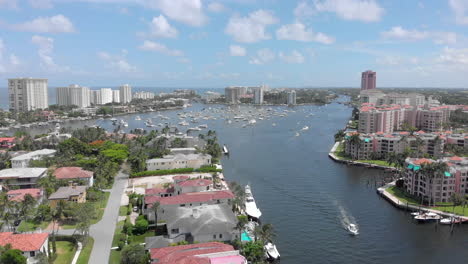High-aerial-drone-shot-over-waterway-canal-for-boats-and-yachts-in-Fort-Lauderdale-Miami-Florida-beach-life