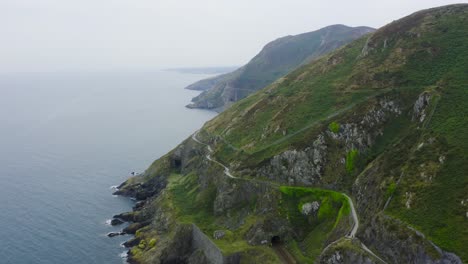 Aerial-view-of-the-Bray-Head-cliffs-with-people-walking-about-the-trails-4
